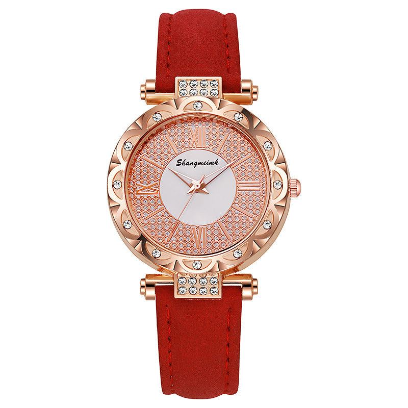Korean-style quartz watch with a simple leather strap.