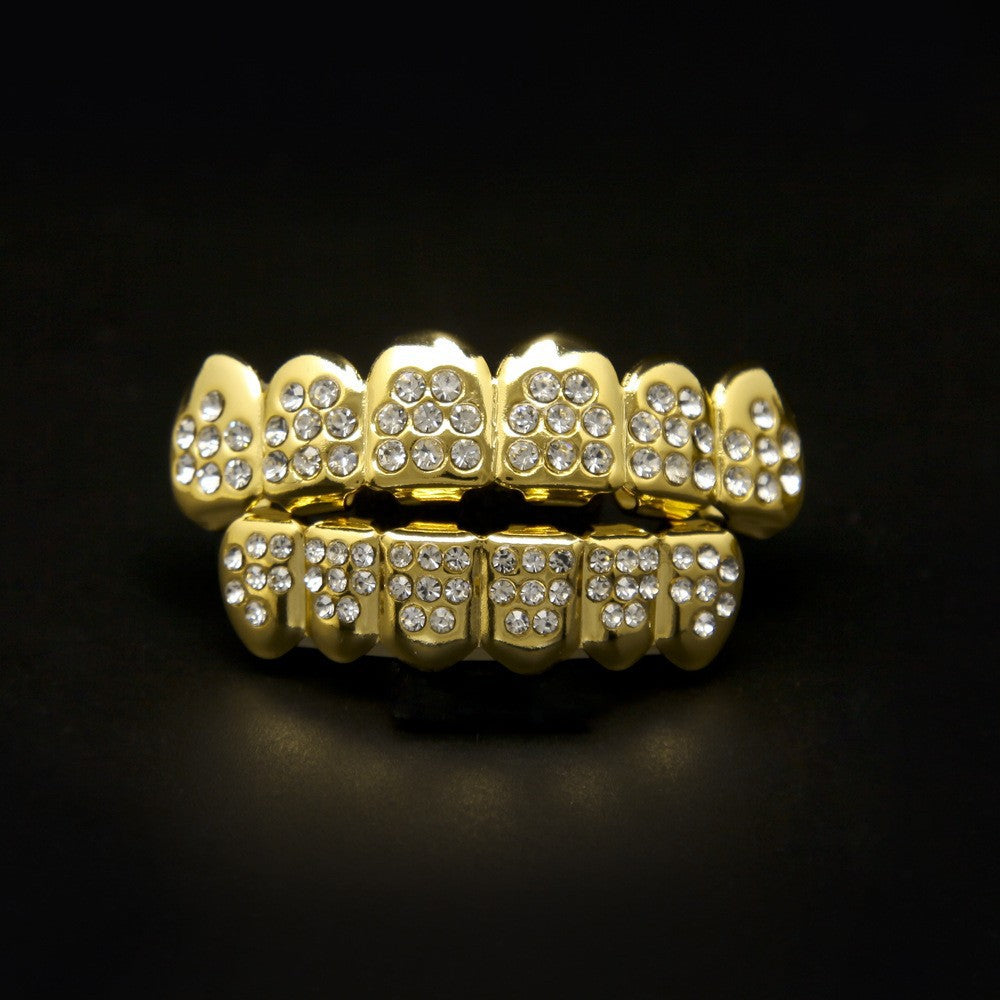 Hip-hop diamond-encrusted and gold-plated teeth grillz
