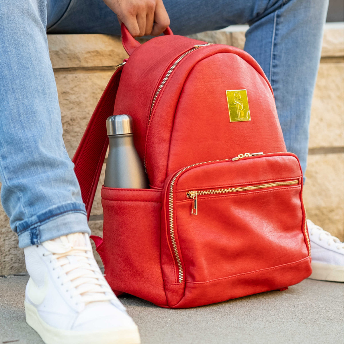 Red Leather Carrier Backpack